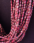 RED PEARL TORSADE WITH SILVER