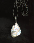 Pendant: Large Fireball Pearl + Raw Diamond Bail